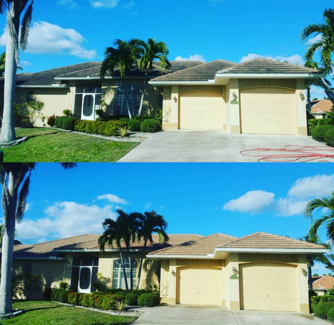 Two-car-garage home with a streaked tile roof above and the cleaned roof below